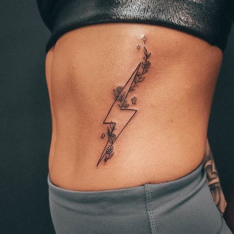 Tattoo Ideas Back Of Forearm, Lightning Bolt With Flowers Tattoo, Cute Punchy Tattoos, Small Tattoo Western, My Protector Tattoo, Koe Wetzel Fyfg Tattoo, Western Tattoos For Women Ribs, Lightening Bolt Tattoo Women, Feminine Lightning Bolt Tattoo