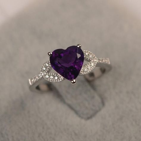 ~~~~~~~~~~~~~~~~Ring details~~~~~~~~~~~~~~~~metal: silver/14k white(rose/yellow) goldcenter stone: heart shape 8*8mm (1.82ct) amethystaccent stone: czNOTE: if it is silver or white gold, it will be get plated with rhodium~~~~~~~~~~~~~~~~Customization is available~~~~~~~~~~~~~~~~you can change, add or remove any parts of the ring if you have good idea. I can add special engraving inside the shank of the ring by free (words, date, simply simbles and so on) too. I am happy to help out or make any a Hear Cut, February Birthstone Ring, Gothic Engagement Ring, September Birthstone Rings, Future Engagement Rings, Purple Amethyst Ring, Purple Rings, Silver Engagement Ring, Engagement Ring Shapes