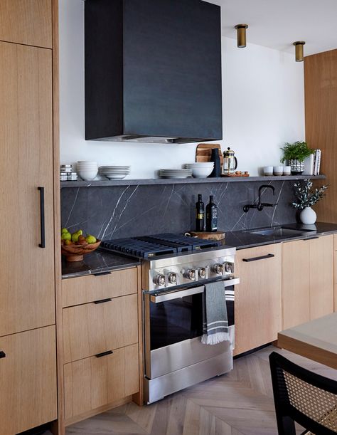 Black Soapstone Countertops, Modern Loft Kitchen, Black Backsplash, Loft Kitchen, Black Countertops, Condo Kitchen, Flat Panel Cabinets, Kitchen Hoods, Wood Kitchen Cabinets