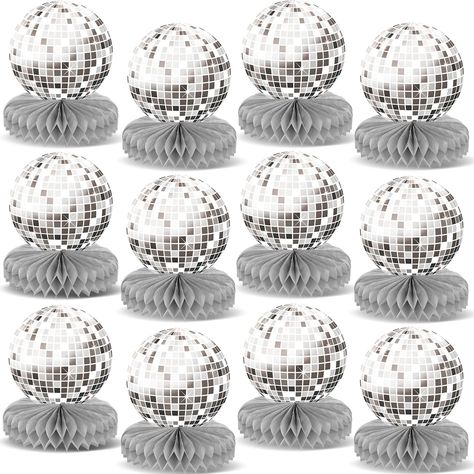 PRICES MAY VARY. You can get:This disco 70s party decorations includes 12pcs disco theme party table toppers .Our 70s disco honeycomb centerpieces unique design makes these party decorations an impressive addition to disco theme birthday party. Size Details: Disco 70s party table toppers sizes the centerpieces 5.9X5.9inches(15X15cm),the honeycombs parts 5.9X1.6inches(15X4cm).These 1970s birthday party decorations that you can put where you like to make your party more atmospheric. High Quality M Disco Party Table, 70s Birthday Party, 70s Themed Birthday Party, 70s Party Decorations, Kids Party Centerpieces, 70s Birthday, Disco Ball Party, Disco Theme Party, 70s Party Theme