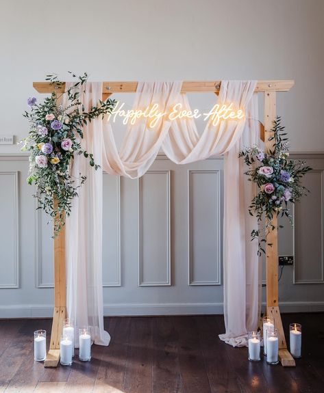 Obsessed. 😍 My current wedding obsession is this dreamy ceremony arch, draped in cascading chiffon and dressed with seasonal spring blooms. Large scale pieces like this are 👌 perfect 👌 for your wedding ceremony, they create a focal point in your space and frame you and your partner as you exchange vows. Later, they can repurposed as a photo backdrop (the neons are great for this) or positioned behind your top table during your reception. Endless possibilities! @lauramayphotographyuk ... Wood Wedding Arch With Draping, Behind Top Table Decor Wedding, Wedding Focal Point, Wedding Arch With Drapes, Wedding Altar Ideas Indoor, Wedding Arch With Draping, Drape Wedding Arch, Wedding Arches Diy, Simple Wedding Reception Table Decor