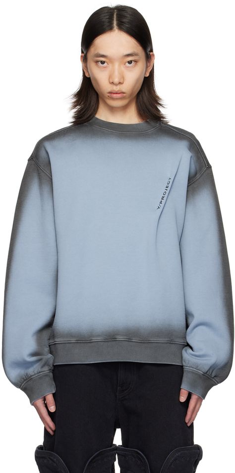 Cotton fleece sweatshirt. Spray paint effect throughout. · Rib knit crewneck, hem, and cuffs · Pinched seam and printed logo at front · Dropped shoulders Supplier color: Blue/Grey Fleece Men, Winter Hoodie, Hoodie Graphic Design, Spray Paint Sweatshirt, Spray Painted Shirt, Functional Blue Sweatshirt For Streetwear, Fleece Sportswear Sweatshirt With Graphic Print, Full Sleeve T-shirt For Men, Blue Fleece Sweatshirt With Logo