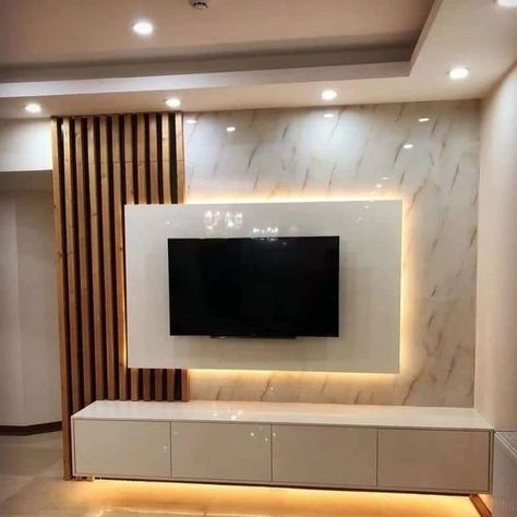 Tv Unit Design idea ✨️ #trendingpost #homedecor #interiordecorating #livingroomdesigns #interiors #reelitfeelit #tvunitdesigns #homedesignsdworld #interior #tvunit #livingroomdesign #wallpanels #interiordesign #fypシ゚viralシ2024fyp #newkitchenhacks #makeupaddict #tanremoval #papercraft #healthybodytips Tv Cabinet Design Modern, Tv Wall Ideas, Modern Tv Room, Modern Apartment Design, Tv Unit Furniture, Tv Cabinet Design, Tv Unit Interior Design, Wall Tv Unit Design, Unit Design