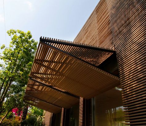 Timber Facade Architecture, Wood Slat Facade, Rattan Shutters, Sliding Shutters Exterior, Wooden Facade Architecture, Louvres Facade, Modern Shutters Exterior, Louvers Design Interior, Folding Shutters