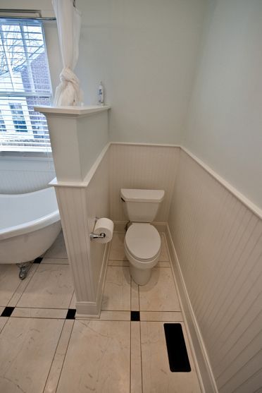 This would work in our new/old bathroom Wall Between Toilet And Tub, Toilet Beside Tub, Bathroom With Privacy Wall, Privacy Toilet Wall, Toilet With Half Wall, Toilet Divider Wall, Privacy Wall For Toilet, Bathroom With Hidden Toilet, Toilet Divider Wall Ideas