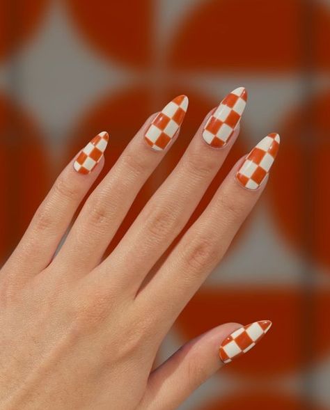 Burnt Sienna Checkers – Warm Orange and White Checkered Nail Bold sienna orange meets clean white lines in this classic checker pattern inspired by the color stories of mid century modern decor. Choose your preferred nail shape and length! Designed by Keara. Burnt sienna checkers Checkered nails Nail length Nail shape Flag nails Hair and nails Nails Chex Nail Art, Retro Checkered Nails, Orange And White Checkerboard Nails, Red And White Checkered Nails, Wavy Checkered Nails, Checkered Almond Nails, Orange Checkered Nails, Checkered Flag Nails, Retro Nails Vintage