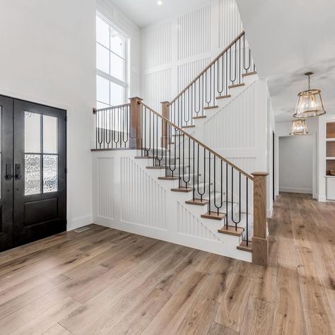 Millhaven Homes on Instagram: “This floor plan and entry feels so open and spacious. You step through the front doors door and it automatically invites you inside. . .…” Stairs At Front Door Entry, Entry Paneling, Stairway Entry, Millhaven Homes, Front Entry Doors, Staircase Design, Taos, Interior Trim, Front Doors