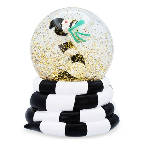 Flaunt your fandom with this collectible Beetlejuice snow globe! Featuring a sandworm from Tim Burton's Beetlejuice, this approximately 4-inch snow globe will liven up any display! Officially licensed snow globe. Produced by Silver Buffalo, a trendsetting housewares and home decor company based in the heart of New York City. Beetlejuice Room, Tim Burton Beetlejuice, Beetlejuice Sandworm, Beetlejuice Movie, Beetlejuice Halloween, Spencers Gifts, Random Items, Jack And Sally, Christmas Characters