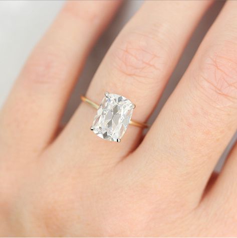 This stunning mine-free diamond solitaire features a 3.5ct antique-cut elongated cushion diamond. A delicate band and setting make this striking center diamond the star of the show. Invoking a bygone era, this vintage-inspired ring is sure to make a statement on every occasion. Details: 14k rose, yellow, or white gold, or platinum 3.5ct lab grown diamond *all diamonds are G color, VS2 clarity or better *all center diamonds are IGI certified and come with a grading report and laser-inscribed seri Cushion Solitaire Ring, Cushion Solitaire, Elongated Cushion Cut, Colored Diamond Rings, Elongated Cushion, Cushion Cut Moissanite, Antique Diamond Rings, Moissanite Earrings, Cushion Cut Diamonds