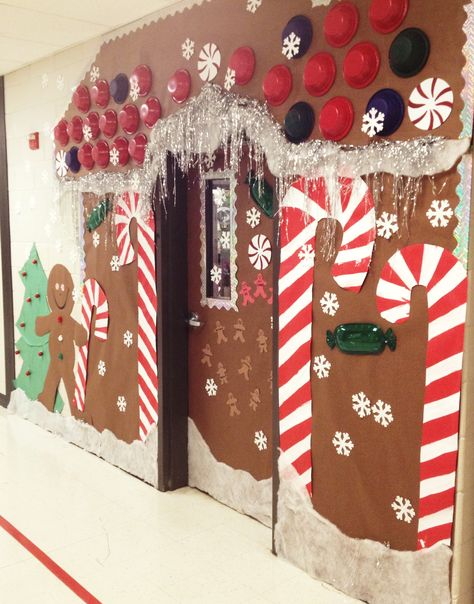 Christmas Holiday Door decoration, for school.  Gingerbread house door. I spent about $12 on this door decor (school provided paper) but took about 5 hours to do. But so worth it- all the kids really love it!   Thanks to a couple pinterest ideas I collaborated from! Diy Christmas Door Decorations, Holiday Door Decorations, Diy Christmas Door, Christmas Door Decorating Contest, Christmas Classroom Door, Christmas Door Decoration, School Door Decorations, Door Decorating Contest, Christmas Bulletin