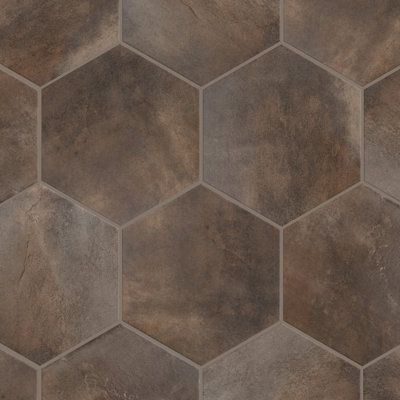 Inspired by a modern look, our Industrial Hex Porcelain Floor and Wall Tile provides decorative appeal that adapts to a variety of stylistic contexts, making it a great choice for your space. With its impervious, frost-resistant features, this hexagon tile is an ideal selection for both indoor and outdoor installations, including bathrooms, backsplashes, showers, hallways, entryways, patios, and fireplace facades. This tile is a perfect choice on its own or paired with other products in the Indu Cool Floor Tile, Brown Hexagon Tile Bathroom, Brown Tile Bathroom Floor, Hexagon Kitchen Floor Tile, Brown Tile Floor Bathroom, Hexagon Wood Tile, Brown Floor Tile, Octagon Tile Bathroom, Brown Tile Shower