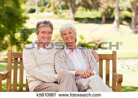 Senior couple on the bench View Large Photo Image Older Couple Poses, Retired People, Older Couple, Elderly Couples, Employee Benefits, Anniversary Photoshoot, Old Couples, Poses References, Anniversary Photos