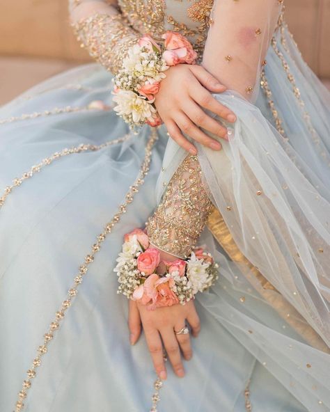 Soft Blue Outfit, White Rose Corsage, Haldi Bride, Bridal Shop Ideas, Bride Fashion Photography, Locket Ideas, Eid Look, Fresh Flower Jewelry, Bridal Mehndi Dresses