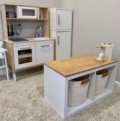 Preschool Play Kitchen Area, Playroom With Toy Kitchen, Kitchen In Playroom, Diy Play Checkout Counter, Playroom Play Kitchen, Play Kitchen Counter Space, Cube Shelf Play Kitchen, Play Kitchen In Living Room, Playroom Kitchen Set Up