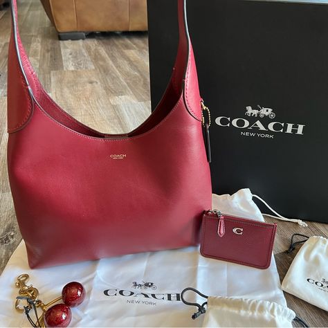 Up For Your Consideration Today Is A Brand New Tiktok Trending! Coach Brooklyn 28 In The Sold Out Ruby Color! Included Is Matching Coach Mini Skinny & Cherry Bag Charm. This Is The "It" Bag Of The Season, Absoulutly Stunning! This Coach Brooklyn 28 Shoulder Bag Is A Stylish Addition To Any Outfit. With A Solid Pattern And Magnetic Snap Closure, This Medium-Sized Bag Is Perfect For Everyday Use. The Exterior Is Made Of Beautiful Leather In A B4/Ruby Color, While The Interior Lining Is Also Made O Vintage Coach Bags Red, Brooklyn Coach Bag, Coach Brooklyn 28, Coach Brooklyn, Cherry Bag, Fancy Things, Ruby Color, Vintage Coach Bags, It Bag