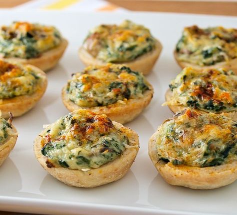 10 Savory Tarts That Make Awesome Appetizers | http://homemaderecipes.com/10-savory-tarts/ Mushroom Tarts, Mushroom Tart, Spinach And Mushroom, Savory Tart, Spinach Stuffed Mushrooms, Muffin Tin, Tart Recipes, Appetizers For Party, Pavlova