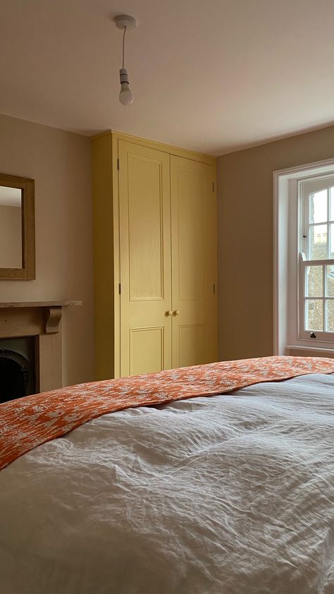 Tan Paint Bedroom Ideas, Wardrobe Painted Same Colour As Wall, Jonquil Paint Edward Bulmer, Mason Pink Edward Bulmer, Jonquil Edward Bulmer, Yellow Panelling Bedroom, Edward Bulmer Cinnamon, Edward Bulmer Paint Clove, Trumpington Edward Bulmer