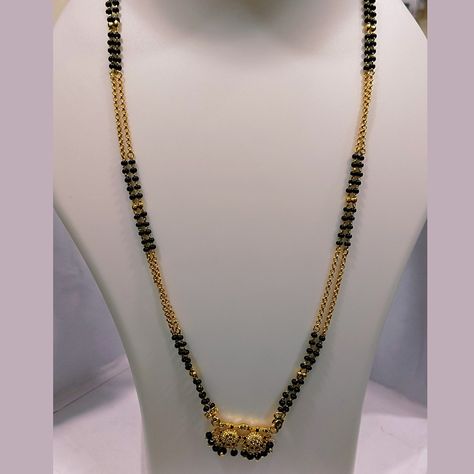 Black Beads Chain with Locket – Long Price: ₹250/- Shop Now: Visit our webpage (https://snigdhacollections.com/product/bla-00006-2/) or contact us via call or WhatsApp at 084999 91138. Black Beats Chains Gold, Gold Beaded Long Necklace, Black Beads Chain, Bappa Photo, Black Beats, Mangalsutra Design, Gold Jewels Design, Black Gold Chain, Gold Necklace Simple