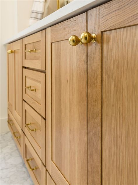 Stick to the warm color palette and pair natural rift cut white oak with these gold knobs & pulls Wood Kitchen Gold Hardware, Oak Cabinets Gold Hardware, Wood Cabinets Gold Hardware, Gold Hardware Kitchen, Modern Oak Kitchen, White Oak Kitchen Cabinets, Gold Kitchen Hardware, Bathroom Vanity Remodel, White Oak Kitchen