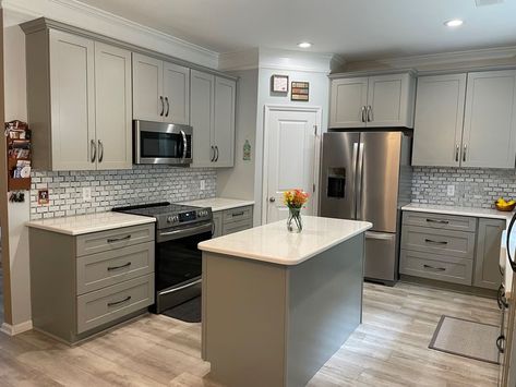 Cabinets were done in the Catalina shaker door in a beautiful pebble grey color. Kraftmaid Pebble Gray Cabinets, Pebble Grey Kitchen Cabinets, Pebble Grey Kitchen, Foxtail Palm, Reno Kitchen, Kraftmaid Cabinets, Kitchen 2022, Light Gray Cabinets, Pebble Grey