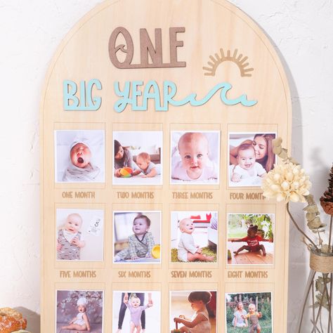 PRICES MAY VARY. MEMORABLE MILESTONES DISPLAY - Capture the journey of your little surfer's first year with The Big One Surf One Year Old Photo Board! This beautifully crafted wood board provides the perfect backdrop to showcase your baby's monthly milestones, creating a cherished keepsake for years to come. WAVE-THEMED DESIGN - Ride the wave of excitement with this surf-themed photo board! Featuring vibrant colors and playful wave designs, it adds a fun and whimsical touch to your little one's Surf 1st Birthday Party Boy, Ocean Theme First Birthday, Surfer First Birthday, 12 Months Photo Frame, First Year Photo Display, The Big One Surf Birthday, 1st Birthday Decoration, Surf Birthday Party, Surf Birthday