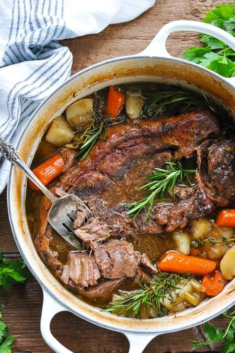 Tender and juicy, this Dutch Oven Pot Roast transforms an affordable cut of meat into a delicious comfort food dinner. The beef slowly bakes with potatoes and carrots for an easy one pot meal. Your whole family will love this classic Sunday pot roast recipe! Chuck Roast Recipe Beef Roast Recipes, Roast In Dutch Oven, Sunday Soup, Dutch Oven Pot Roast, Recipes Hamburger, Oven Pot Roast, Leftover Pot Roast, Chuck Roast Recipes, The Seasoned Mom