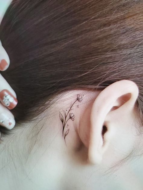 Behind Ear Simple Tattoo, Lily Ear Tattoo, Behind The Ear Floral Tattoo, Wildflower Tattoo Behind Ear, Flower Tattoos Behind The Ear, Floral Tattoo Behind Ear, Water Lily Tattoo Behind Ear, Behind Ear Floral Tattoo, Floral Behind Ear Tattoo