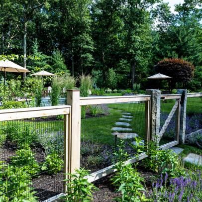 French Country Pictures | HGTV Photos French Garden Fence Ideas, French Country Fence Ideas, French Country Fence, Pretty Landscaping, Country Pictures, Kidney Shaped Pool, Country Fences, Arch Trellis, Front Fence