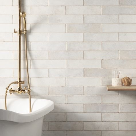 Modern meets rustic with the Vandalay Collection, offering a unique reinvention of the hexagon and subway tiles. With worn edges and a uniquely textured surface featuring a reflective chameleon ink, this series redefines vintage with contemporary colors and a depth of design. Artmore Tile Vandalay 22-Pack White 3-in x 12-in Polished Ceramic Subway Wall Tile | EXT3RD107690 White Shower Tile, Artmore Tile, Glossy Ceramic Tile, Subway Tile Showers, Kalay, Ceramic Tile Backsplash, Subway Tiles Bathroom, White Tile Backsplash, Shower Wall Tile