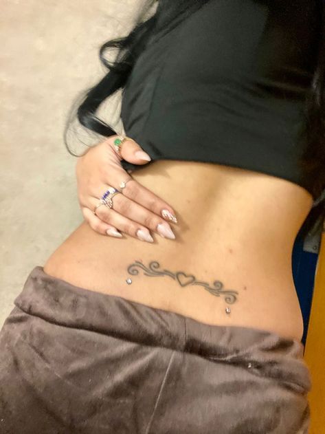 Back Pearcing, Mid Stomach Tattoo, Tramp Stamp With Back Dermals, Waistline Tattoos, But Tattoos For Women, Tramp Stamp Tattoos Small, Cute Back Tattoos, Pretty Tramp Stamp Tattoos, Trampstamp Tattoo