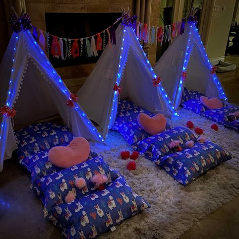 Everything you need to host a llama themed birthday glamping tent sleepover party. Each Party Kit will cover 3 kids. 3 White with pom pom Glamping Tee Pee Tents- complete with coordinating carry bag 3 stands of Blue fairy lights to decorate each tee pee tent as desired. 2 llama themed tee pee banners to hang between the tee pees 3 large purple polka dot hair bows to clip at the tops of the tee pees 6 coral lace bows to clip at the tee pee ties backs at the tee pee door entrance. 3 llama print pi Tent Party Decorations, Teepee Tent Party, Tent Sleepover Party, Birthday Glamping, Tee Pee Tent, Tent Sleepover, Blue Fairy Lights, Glamping Birthday Party, Sleepover Beds