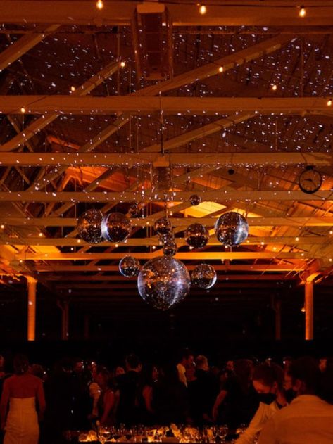 new years eve wedding. winter wedding lighting. wedding reception ideas. dance floor. wedding reception decor. new years eve party. disco ball decor. Over Dance Floor Decor, Wedding Reception Dancing Aesthetic, Dance Floor Decorations Parties, Disco Balls Dance Floor, Wedding After Party Dance Floor, Disco Ball Wedding Decor Dance Floors, New Years Eve Wedding Ideas Decorations, Winter Wedding Dance Floor, Wedding Party Lights