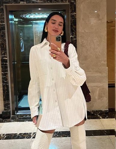 Drop Earrings Outfit, Bottega Veneta Outfit, Celebrities Earrings, Earrings Outfit, Chunky Gold Hoop Earrings, Tear Drop Earrings, White Boots, Dua Lipa, Back In Stock