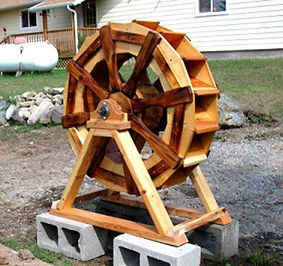 The RunnerDuck Waterwheel plan, is step by step instructions on how to build a decorative waterwheel. Outdoor Aquaponics, Water Wheel Diy, Diy Water Wheel Generator, Wooden Wheels How To Make, Waterwheel Diy, Waterwheel Fountain, Water Wheels, Hey Mama, Wooden Wheel