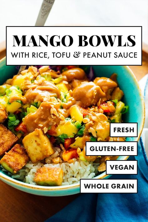 Meet your new favorite summer dinner, these refreshing and hearty mango tofu bowls! They're made with brown rice, fresh mango salsa, tofu and peanut sauce. Think of them as an Asian spin on your favorite burrito bowl. #mango #tofu #vegan #vegetarian #dinnerrecipe #cookieandkate Mango Tofu, Tofu Bowls, Fresh Mango Salsa, Plat Vegan, Tofu Vegan, Burrito Bowls, Crispy Tofu, Vegan Bowls, Burrito Bowl