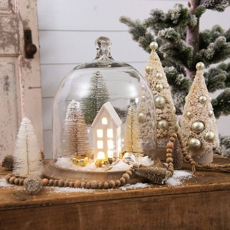 Display everything from little Christmas trinkets, to twinkle lights, to natural elements! Gorgeously large and eye-catching, this Glass Cloche with Mango Wood Base is sure to become a special heirloom piece. Materials: Mango Wood and Glass Dimensions: 12"H x 11"D Care: Hand Wash Only Holiday Lantern Ideas, Christmas Vignettes Display, Christmas Cloche Ideas, Christmas Thrift, Glass Cloche Decor, Christmas Cloche, Cloche Ideas, Large Decorative Bowl, Cloche Decor