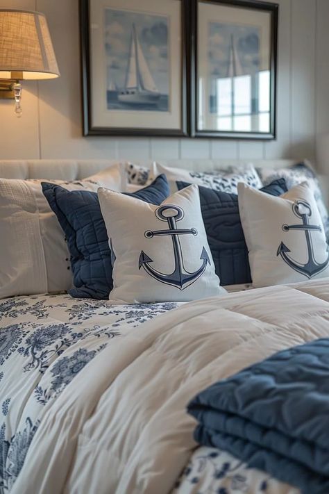 15 Aesthetic Coastal Bedroom Ideas for a Dreamy Retreat 5 Beach Themed Master Suite, Nautical Bedroom Master Decorating Ideas Navy Blue, Nautical Master Bed, Blue And White Coastal Bedroom, Nautical Bedroom Master, Seaside Bedroom Ideas, Nautical Bed, Bedroom Beach Decor, Nautical Bedroom Ideas