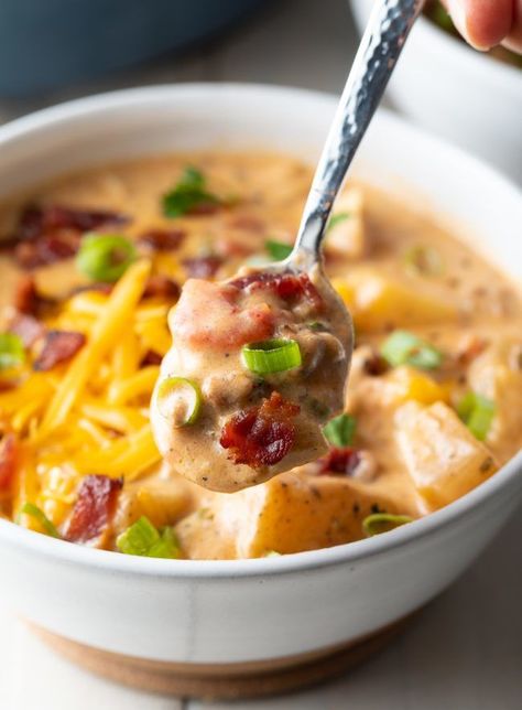 The Ultimate Bacon Cheeseburger Soup Recipe - A foolproof family-pleasing meal that tastes just like a cheeseburger but is enjoyed as a creamy, comforting soup easily made on the stovetop or in a slow cooker. #baconcheeseburger #baconcheeseburgersoup #cheeseburgersoup #crockpotcheeseburgersoup #slowcookercheeseburgersoup #aspicyperspective Bacon Cheeseburger Soup Stovetop, Slow Cooker Bacon Cheeseburger Soup, Bacon Cheeseburger Soup Recipe, Bacon Cheeseburger Chowder, Creamy Cheeseburger Soup Crockpot, Crock Pot Cheeseburger Soup, Bacon Cheeseburger Soup Crockpot, Cheeseburger Soup Stovetop, Creamy Cheeseburger Soup