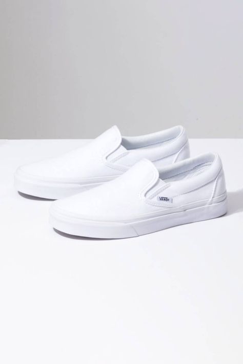 These Vans Classic Slip-On Sneakers for Men in True White will be your new favorite pair of sneakers. Not only are they super trendy, but they will match with everything and super comfy, with the classic canvas white color and slip on design, that you’ll never want to take them off. Features of Vans Classic Slip-On Sneakers for Men in True White | VN000EYEW001: Vans Shoes Style: VN000EYEW001 Color: White Vans sneakers Slip-on sneakers Canvas uppers Padded collars Elastic side accents Signature r Vans Shoes For Men, White Vans Sneakers, Vans White, Classic Vans, White Vans, Men's Vans, Vans Slip On, Sneakers For Men, White Slip