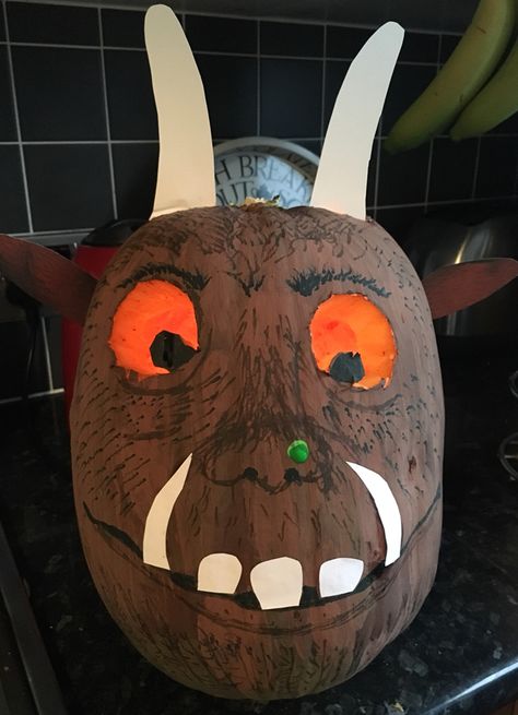 Gruffalo pumpkin - painted gruffalo head with carved out eyes. Very proud of this!!! Made by myself with the help of my little girl Georgia Emeline. Happy Halloween 2016! Gruffalo Pumpkin, Book Pumpkins, Scarecrow Ideas, Pumpkin Painted, Halloween Themed Birthday Party, Character Pumpkins, Pumpkin Books, Painted Pumpkin, The Gruffalo