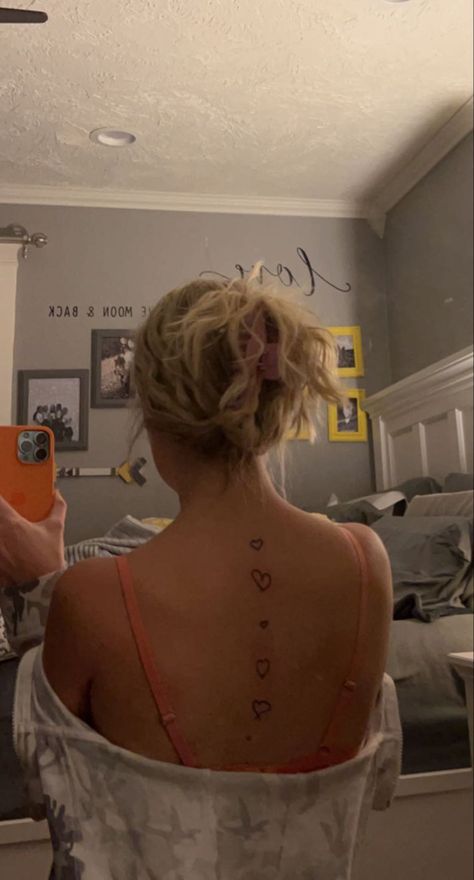 Hearts Down Spine Tattoo, Heart Tattoo On Spine, Heart Tattoo Spine, Heart Back Tattoo Women, Spine Heart Tattoo, Heart Spine Tattoo, Heart Tattoo On Back, Heart Tattoo Placement Ideas, Spinal Tattoo Women Ideas