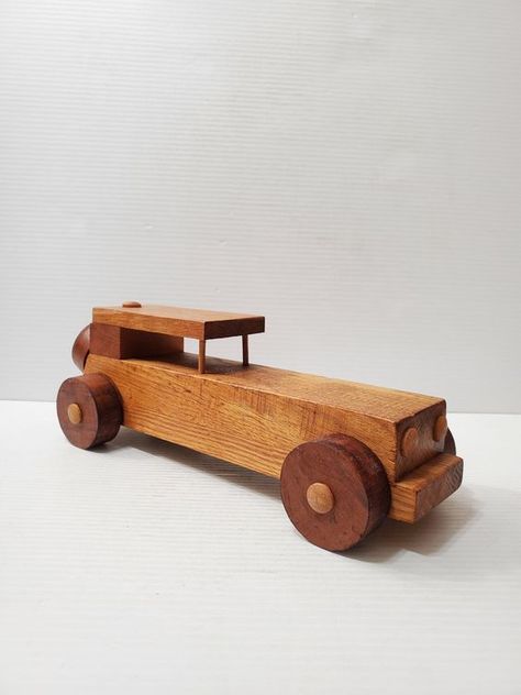 "Wood Toy Car, Hot Rod Coupe, Handmade Paint, Freaky Ford Collection Handcrafted wooden CAR wooden rolling minimalist handmade vehicle toy Wooden Retro Handmade Car Home Décor, Souvenir Car, Gift For Kids, Fathers Day Gift Wooden Car, Retro Vehicle Length 34 cm Height: 12 cm Width: 12 cm It is quite heavy for its size, Feel free to contact us if you have any questions. -- The perfect piece to add VINTAGE STYLE to your decor. Lovely piece in good \"vintage\" condition. All items will be carefully Wood Log Crafts, Wooden Toys Diy, Wooden Airplane, Car Retro, Wooden Toy Cars, Wooden Toys Plans, Handmade Wooden Toys, Bamboo Crafts, Handmade Paint