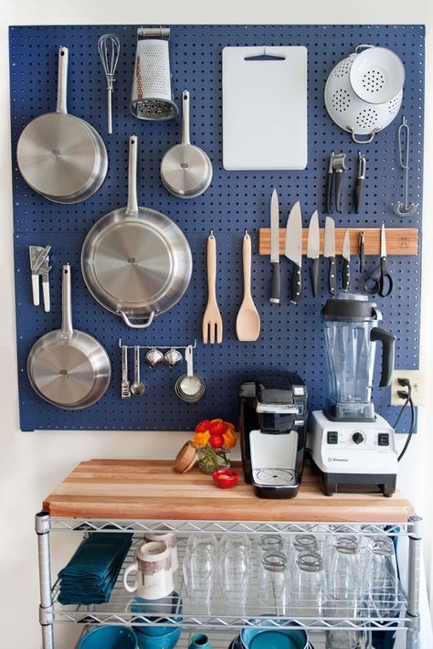 In Case You Forgot, Kitchen Pegboards Are Pretty Awesome — Kitchen Inspiration | The Kitchn Pegboard Craft Room, Pegboard Kitchen, Organiser Cucina, Pan Storage, Kitchen Storage Solutions, Design Studios, Tiny Kitchen, Wall Storage, Peg Board