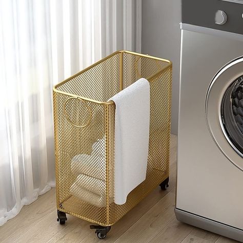 PRICES MAY VARY. ★【Stylish and Durable】: Our laundry basket is made of metal with high-density painting and welding process, the whole is strong, stable, wear-resistant and rustproof, which adds an element of fashion as well as convenience. ★【Hollow Mesh Design】: The laundry basket is designed with a hollow design to keep clothes dry and odor-free, and the simple hollow design and smooth lines bring visual enjoyment. ★【Laundry Basket with wheels】: This laundry basket has a bottom pulley design t Laundry Closet Basket Storage, Vertical Laundry Basket Storage, Laundry Pods Storage, Laundry Hamper Aesthetic, Laundry Room With Closet Storage, Laundry Baskets On Wall, Laundry Basket With Wheels, Things For New Home, Laundry Storage Ideas Organizing