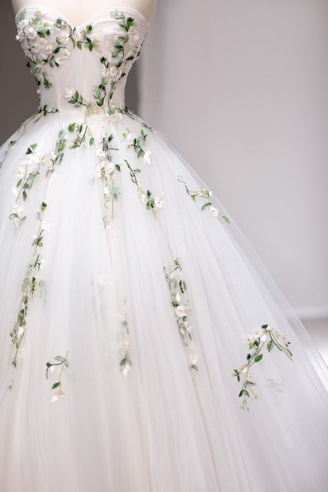 White With Green Wedding Dress, Plant Inspired Wedding Dress, Vine Wedding Dresses, Embroidered Wedding Dress Green, Wedding Ideas Aesthetic Green, Wedding Dresses With Vines, Wedding Dresses With Pink Flowers, White Wedding Dress Green Accents, Non White Wedding Dresses Colour