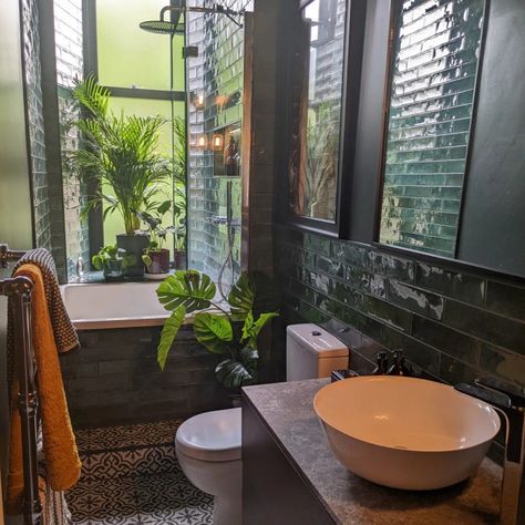 A dark and dramatic bathroom with  deep bath and lots of plants for a luxurious atmosphere Japan Bathroom Design, Zen Bathroom Small, Japanese Bathroom Small, Japanese Inspired Bathroom, Small Soaking Tub, Japan Bathroom, Small Narrow Bathroom, Long Narrow Bathroom, Japanese Style Bathroom