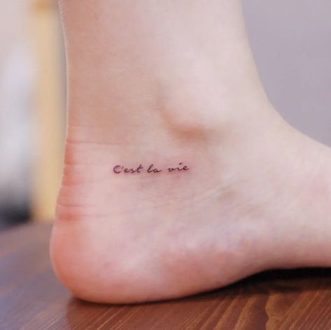 50 Best Travel Tattoos From Around the World Tattoos From Around The World, Tattoos To Get Abroad, Tiny World Tattoo, Meaningful Travel Tattoos, Family Travel Tattoo, Tattoos To Get While Traveling, Travel Ankle Tattoo, Tattoos From Italy, Subtle Travel Tattoo