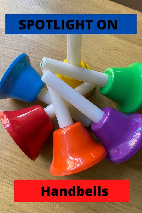 A set of brightly coloured handbells are arranged almost in a circle. They all have white handles that are facing into the middle of the circle. The heading “”Spotlight on Handbells” is on two lines, one at the top of the picture on a blue background, and one at the bottom on a red background. Kids Musical Instruments, School Playground, C Major, Hand Bells, I Am Looking, Percussion Instruments, If Only, What Can I Do, Musical Instrument