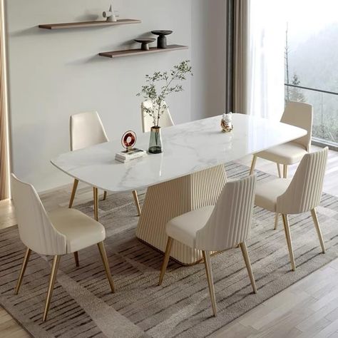 PRICES MAY VARY. 【7 Piece Dining Sets】This elegant style dining table set is including a marbling sintered stone rectangle table, 6 upholstered faux leather chairs. This dining table set allows all family members to sit together and enjoy vittles and beverages and the warm and harmonious atmosphere of the family. 【Practicality & Beauty】This dining table focuses on simple luxury, its tabletop marble veining is a light gray, the veining is intertwined, but not complicated, natural and clear. The 1 Dining Table S, Luxury Dining Tables And Chairs, White Dining Table With Black Chairs, 6 Seater Dining Table For Small Space, Dinning Room Furniture Design, Marble Top Dining Table Luxury, Dinning Tabletop Decor, Dining Table Design Modern Luxury, Small Dining Table Ideas