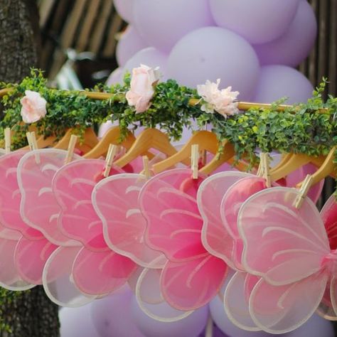 Let’s party! 🎈 on Instagram: "Can’t have a fairy party without the wings 🧚🏻‍♀️ (Clothing rack & fairy sign available for rent) #fairy #fairyparty #firstbirthday #fairyfirst #firstbirthdaytheme #girlparty #fairywings #chicagoparty #chicagopartyplanning" Fairy Wings Party, Dress Up Rack, Fairy Theme Birthday Party, Wings Party, Party Wings, Fairy Garden Birthday Party, Fairy Theme, Garden Party Birthday, Fairy Party